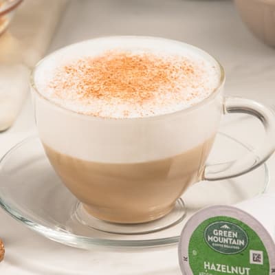 frothed milk over coffee