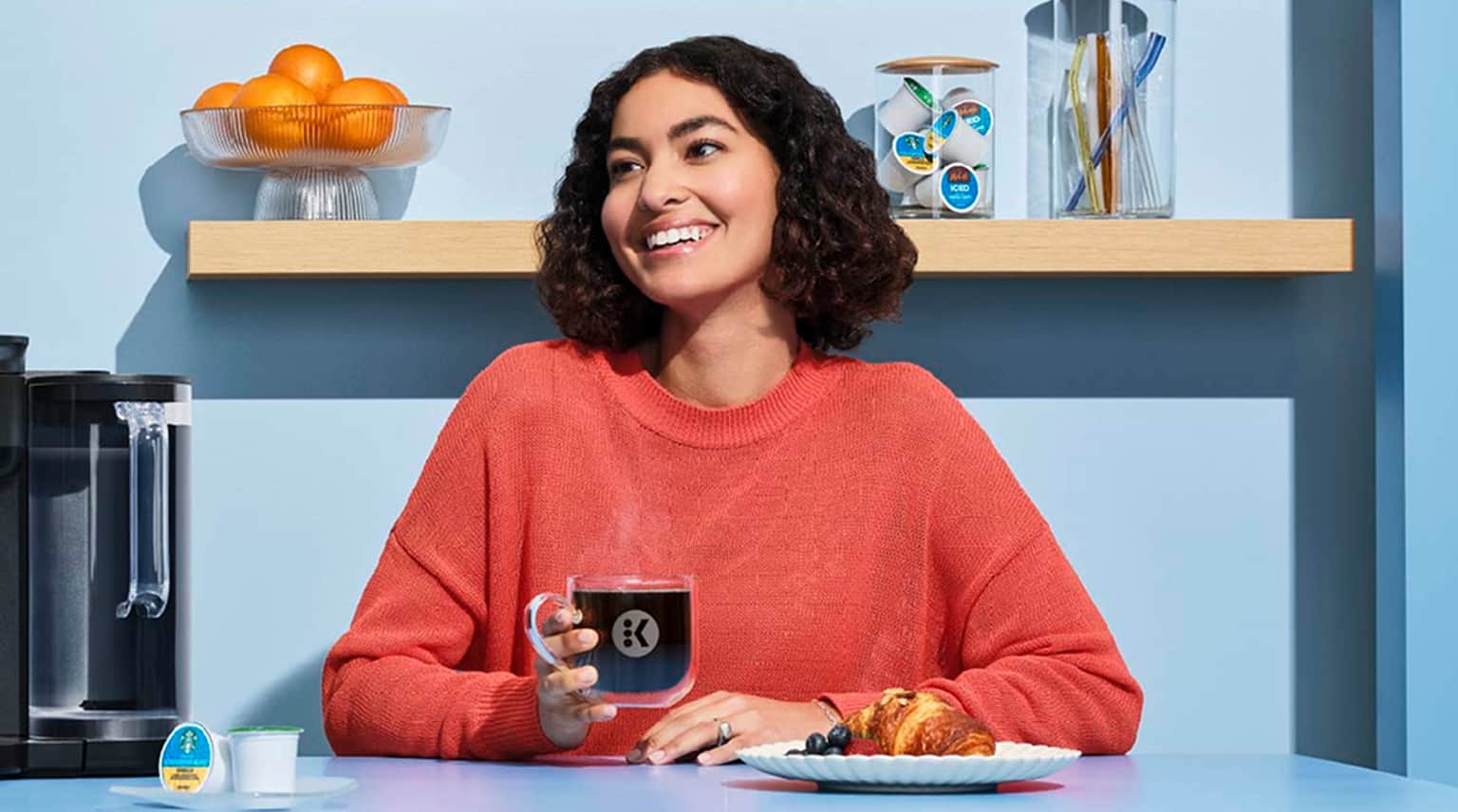 woman drinking coffee looking forward to savings