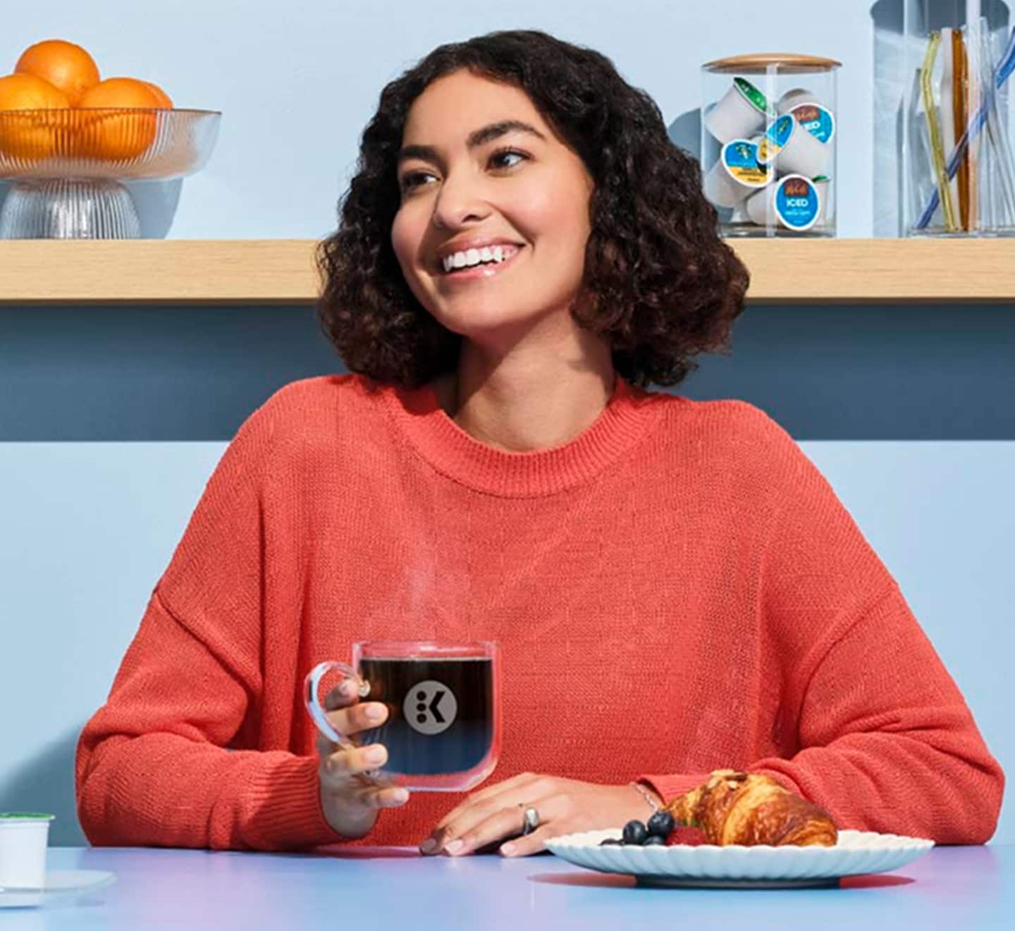 woman drinking coffee looking forward to savings
